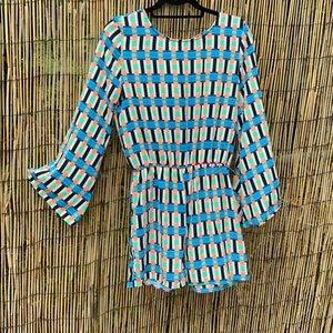 Vibrant geometric print romper